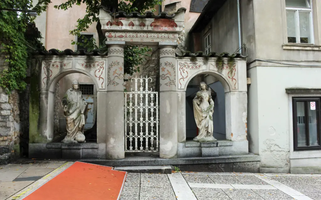 statues in front of a building