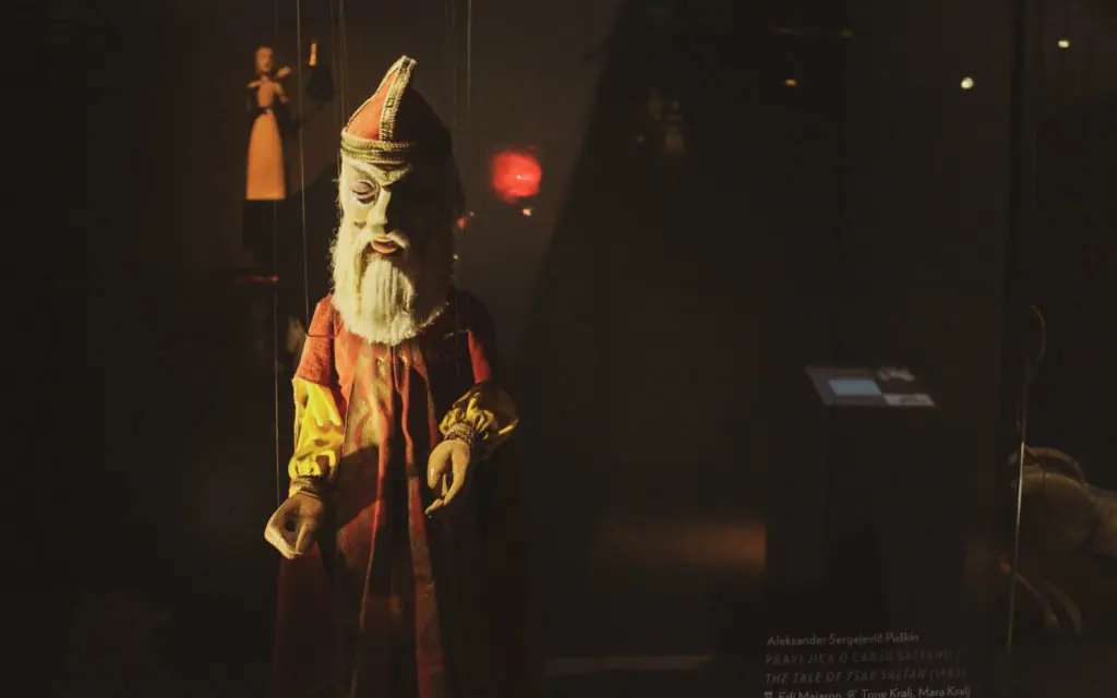 male puppet with a long, white beard
